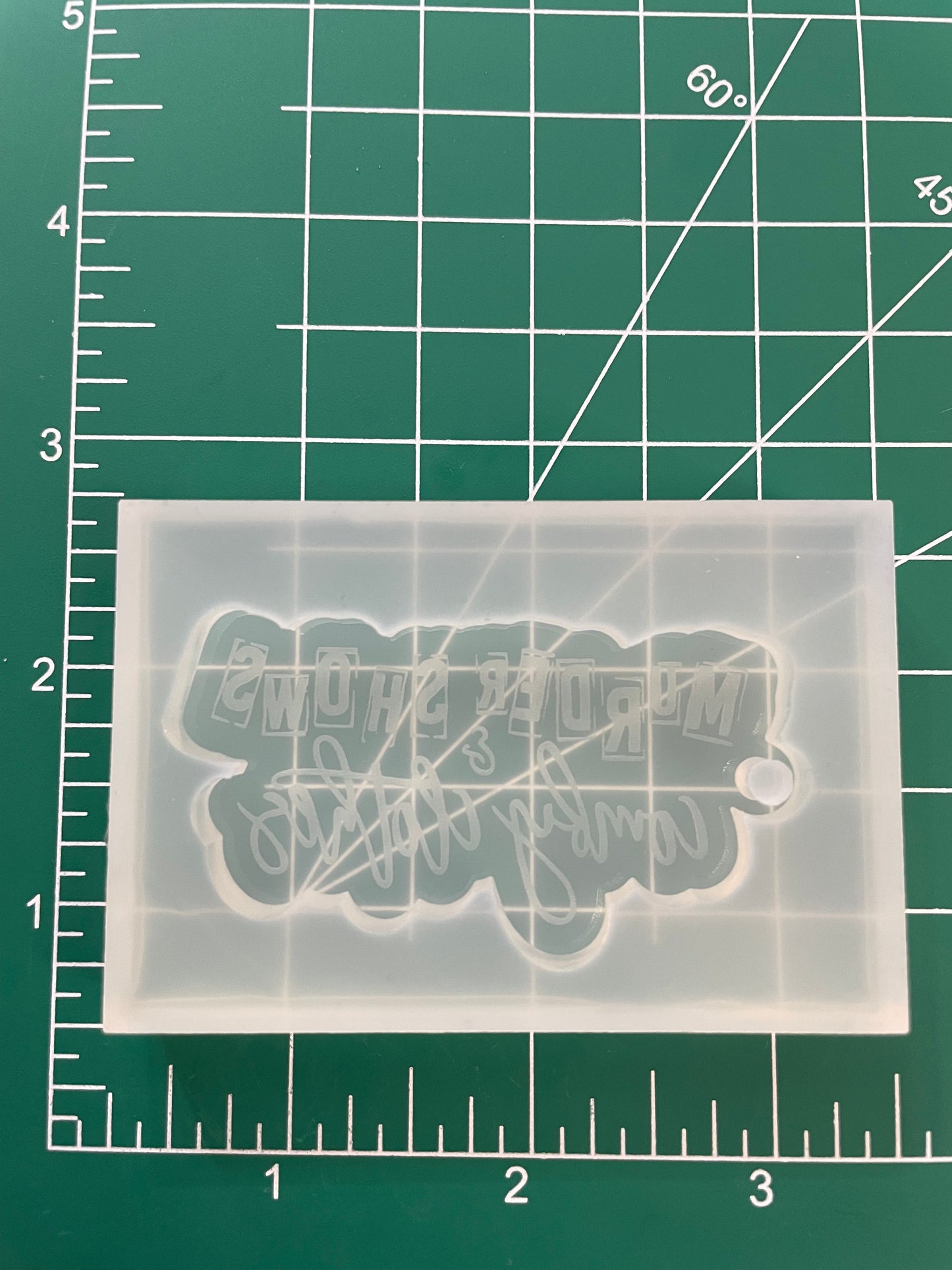 ‘Murder shows and comfy clothes’ keychain mold