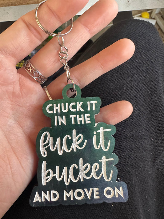‘Chuck it in the fuck it bucket and move on’  keychain