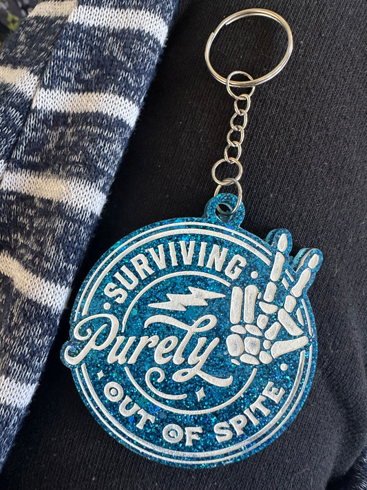 ‘Surviving Purely Out of Spite’ Keychain